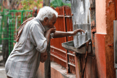 Man Drinking Questionable Water