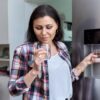 Close-up of water from a refrigerator, highlighting concerns about its effectiveness in removing PFAs from drinking water.