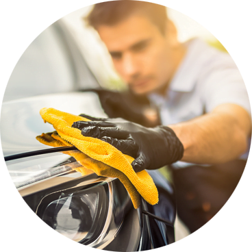 wiping down car after rinsing with distilled water for spotless shine